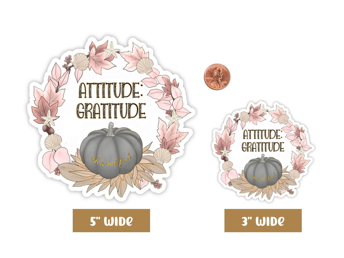 "Attitude: Gratitude" thankful sticker in 5-inch and 3-inch sizes with a penny for scale