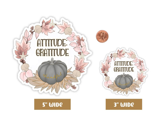 "Attitude: Gratitude" thankful sticker in 5-inch and 3-inch sizes with a penny for scale