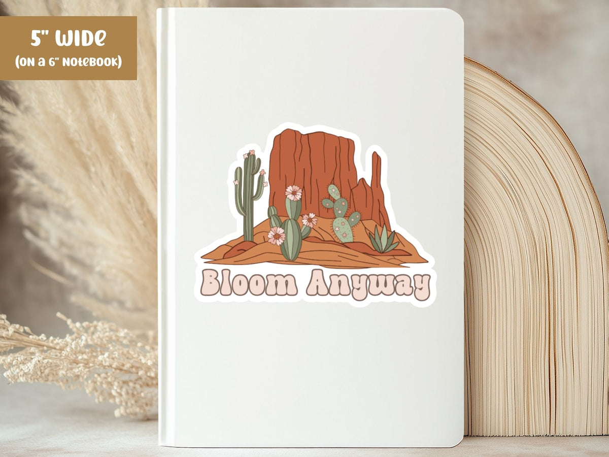 "Bloom Anyway" flower sticker, 5-inch size, on the cover of a white 6-inch notebook