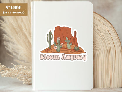 "Bloom Anyway" flower sticker, 5-inch size, on the cover of a white 6-inch notebook