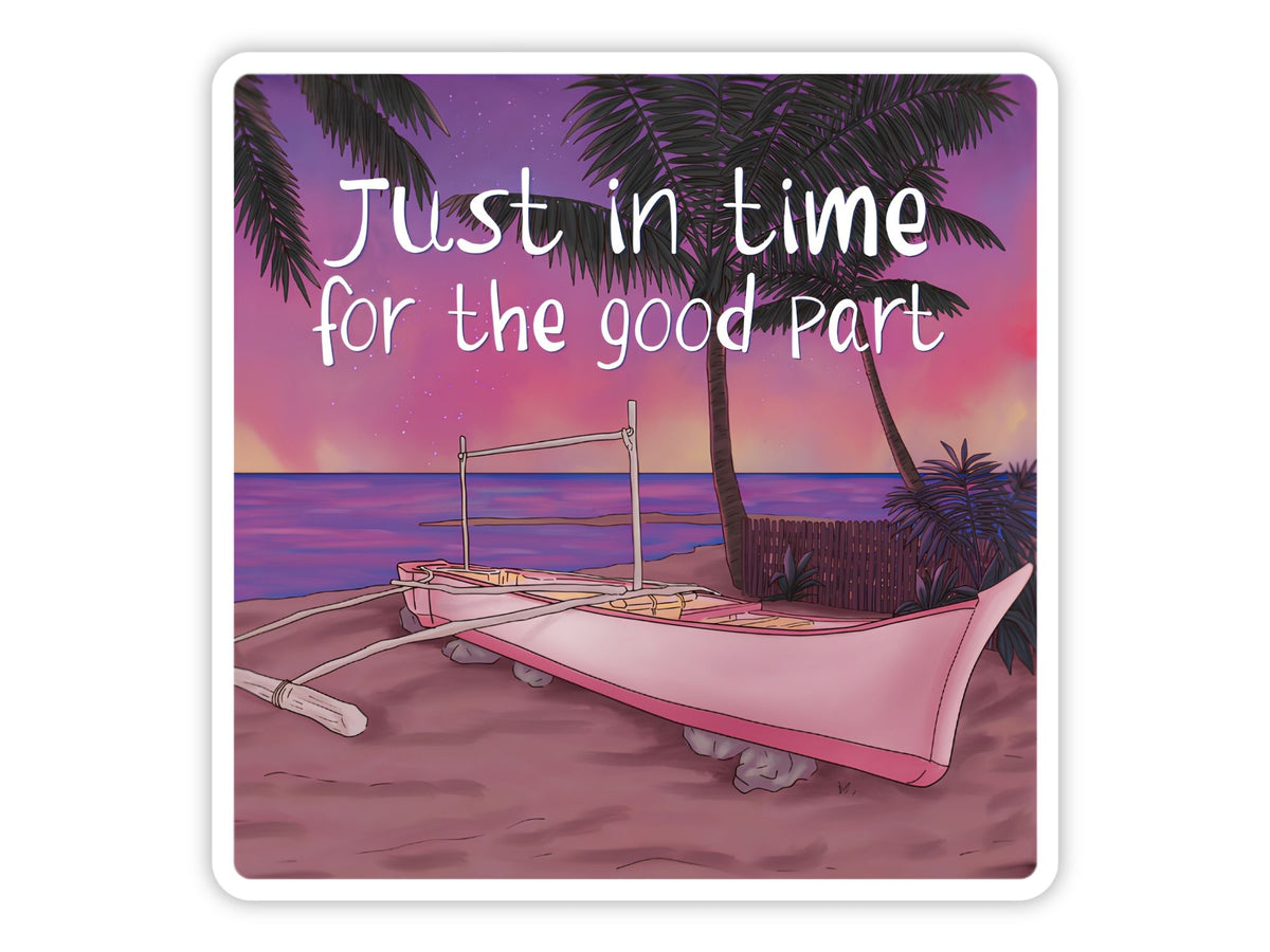 "Just in Time for the Good Part" sunset sticker. A pink boat on the sand under palm trees, with a purple and rose-gold sunset over a calm sea