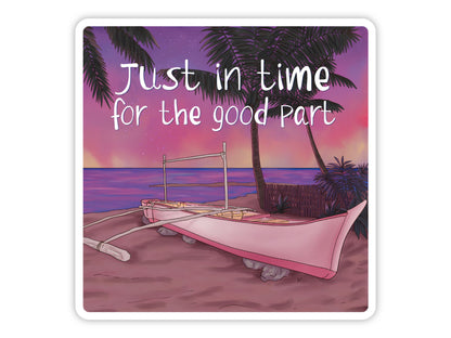"Just in Time for the Good Part" sunset sticker. A pink boat on the sand under palm trees, with a purple and rose-gold sunset over a calm sea