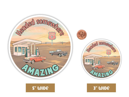 "Headed Somewhere Amazing" retro road trip sticker in 5-inch and 3-inch sizes with a penny for scale