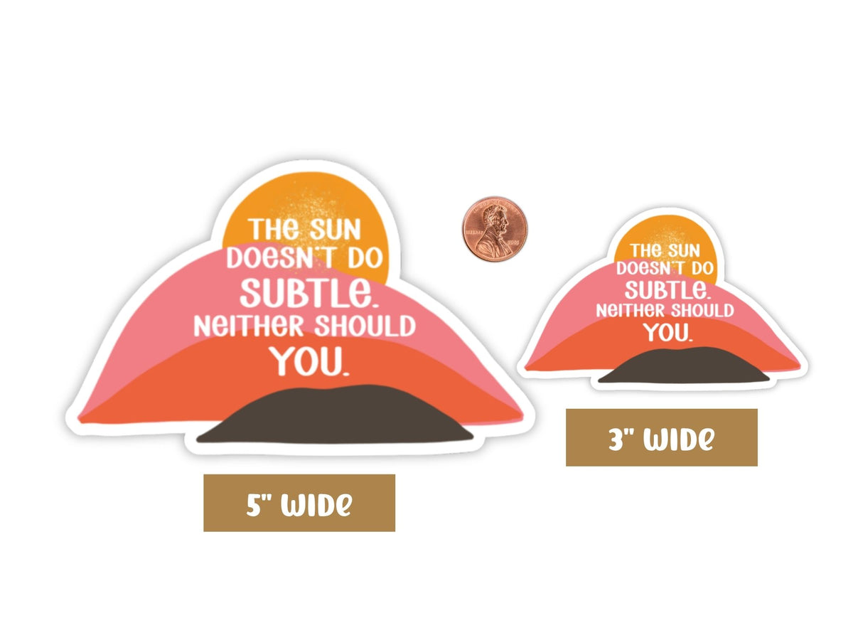 "The Sun Doesn't Do Subtle. Neither Should You." confidence sticker in 5-inch and 3-inch sizes with a penny for scale