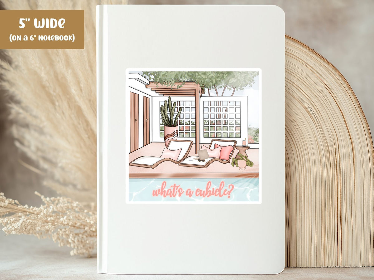 "What's a Cubicle?" work from home sticker, 5-inch size, on the cover of a white 6-inch notebook